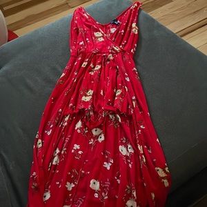 Red floral romper with a floor length skirt
